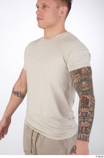 Gilbert beige t-shirt casual dressed upper body 0002.jpg